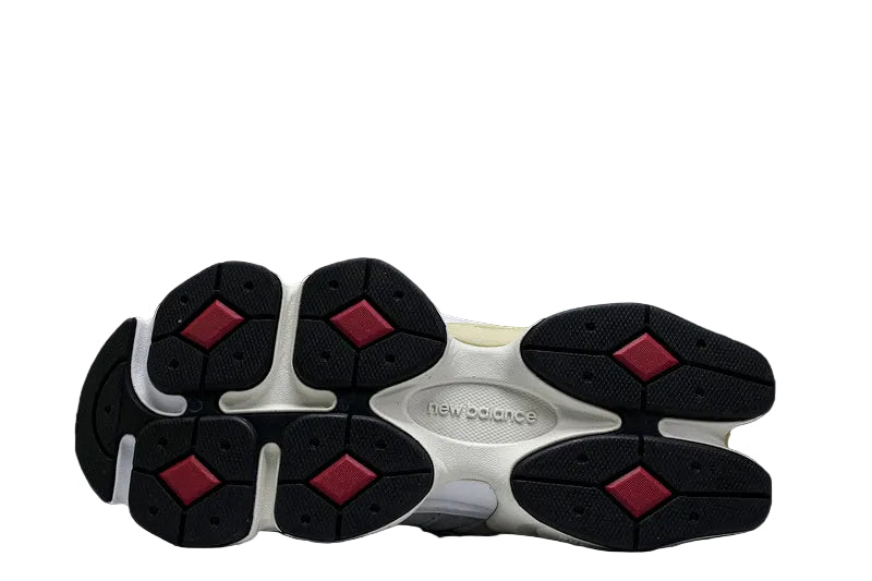 NEW BALANCE 9060 N GRIS DETALLES ROJO